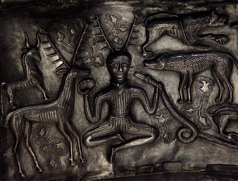 Detail of antlered figure holding a serpent and a torc, flanked by animals (including a stag), depicted on the cauldron found at Gundestrup, Himmerland, Jutland, Denmark. The Gundestrup cauldron is housed at the National Museum of Denmark. Cernunnos