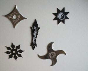  A shuriken  is a small piece of metal with sharpened edges, designed for throwing.