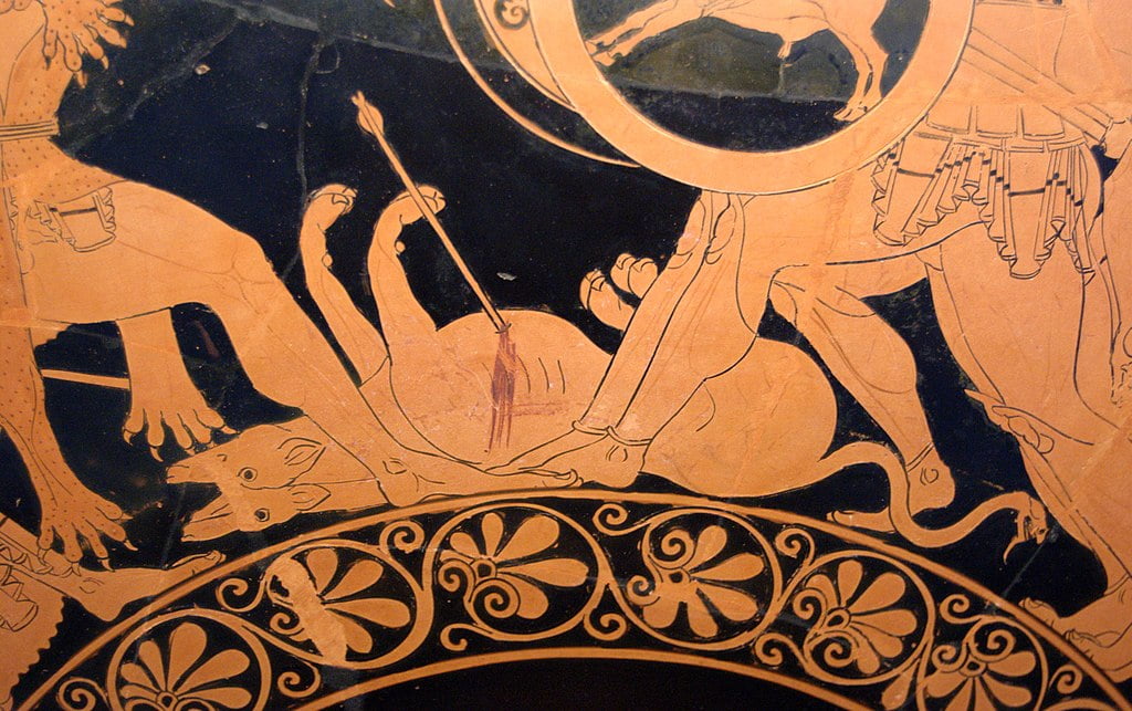 A two-headed Orthrus, with snake tail, lying wounded at the feet of Heracles (left) and the three-bodied Geryon (right). Detail from a red-figure kylix by Euphronios, 550–500 BC, Staatliche Antikensammlungen (Munich 2620). Orthrus