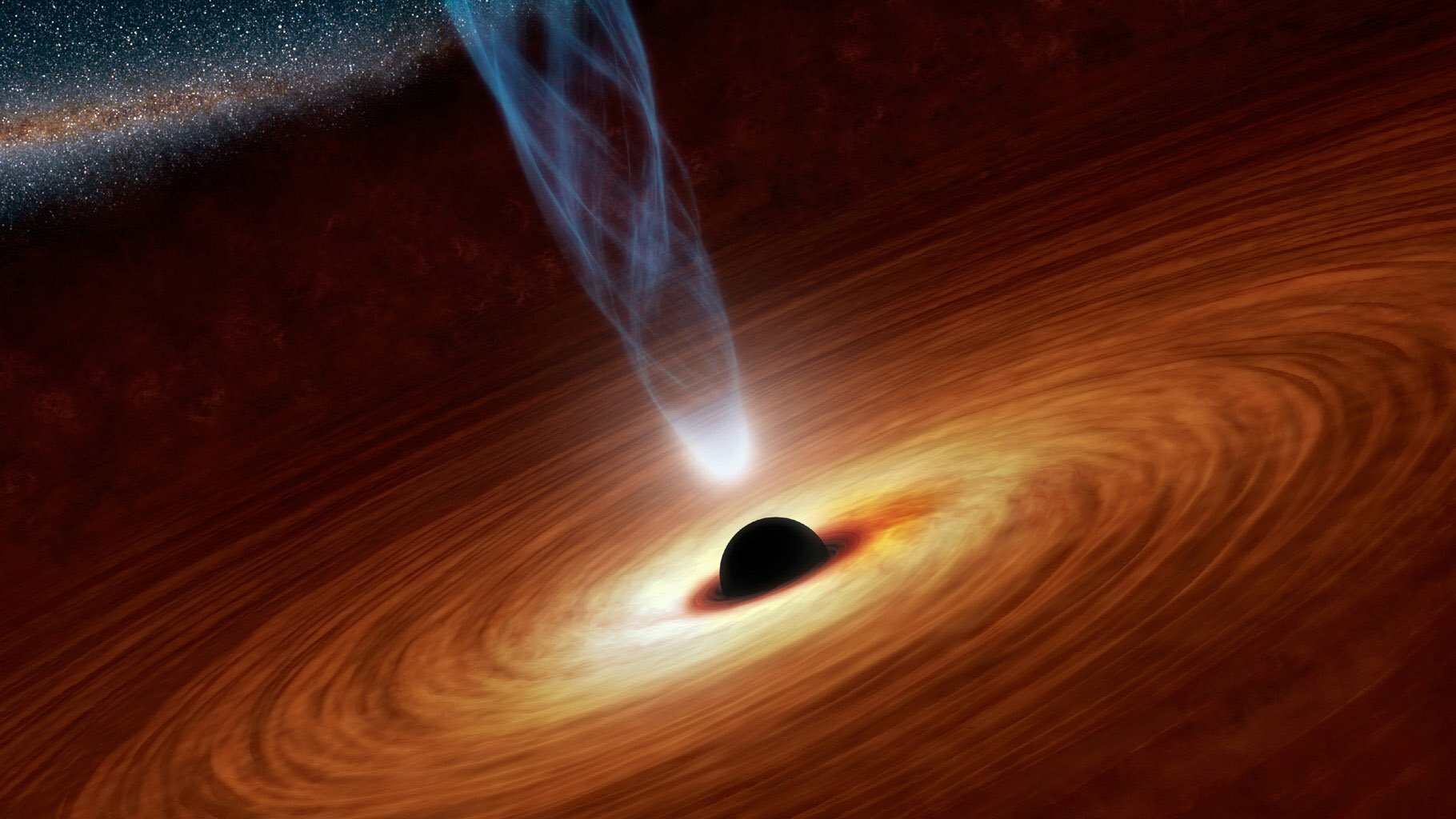  This artist's concept illustrates a supermassive black hole with millions to billions times the mass of our sun. 