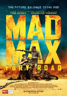 The two protagonist point guns in different directions. The title is seen in the background. Mad Max: Fury Road