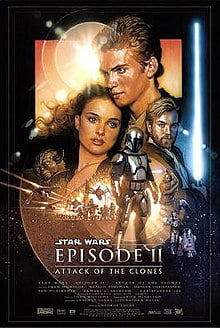 Film poster. A young man is seen embracing a young woman. A man holds a lightsaber. A battle scene is in the middle, and in the lower foreground, there is a man wearing a suit of armor.  Attack of the Clones