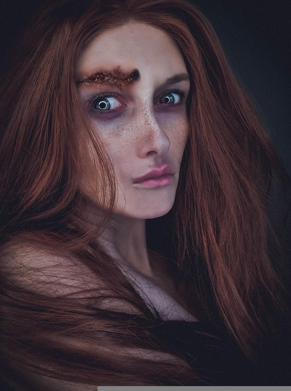 Wounded figure representing the necromantic injury caused by Inflict Light Wounds