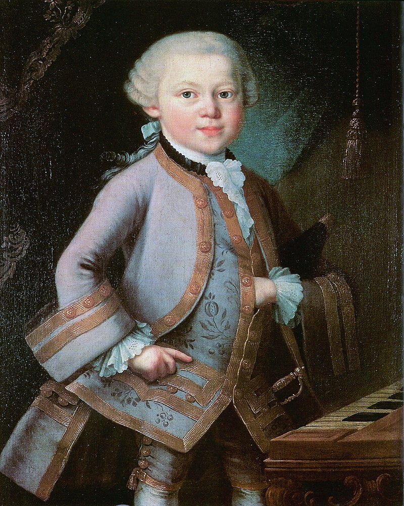 By Anonymous, possibly by Pietro Antonio Lorenzoni (1721-1782) - http://rmc.library.cornell.edu/mozart/images/young_mozart.htm; Portrait owned by the Mozarteum, Salzburg, Public Domain, https://commons.wikimedia.org/w/index.php?curid=454523, Prodigy