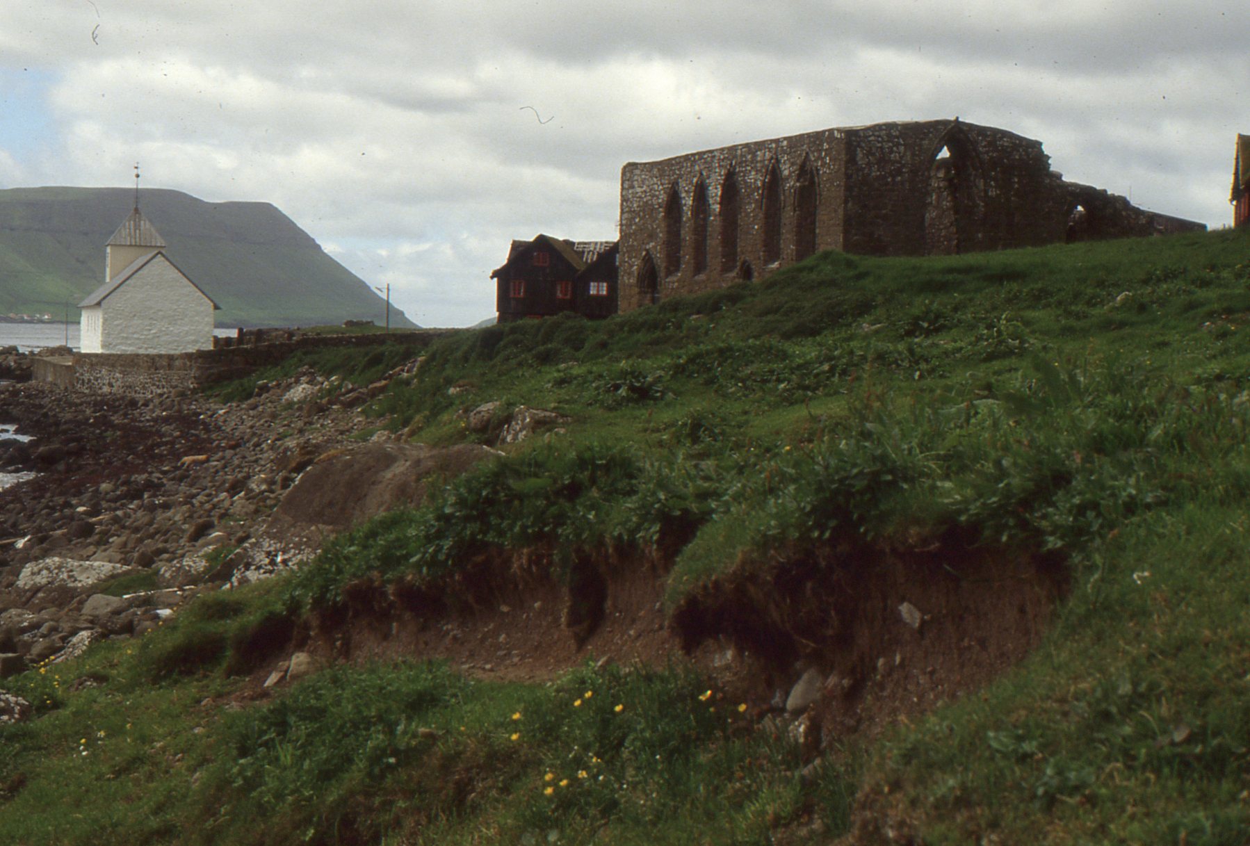 Kirkjubøur with St Olav's Church and the unfinished Magnus Cathedral in the Faroe Islands
