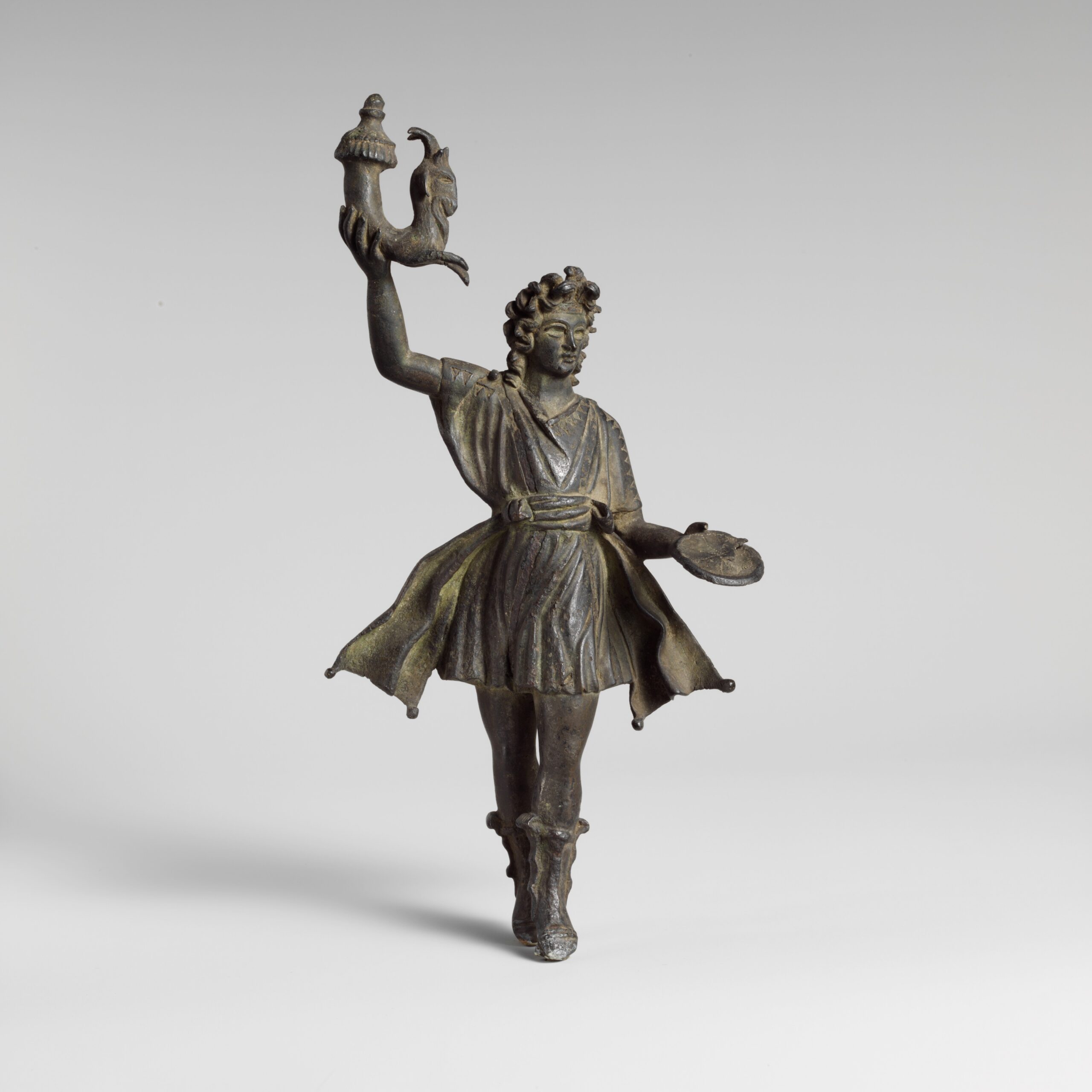 Ancient Roman bronze statuette of a Lar, one of the household guardian gods