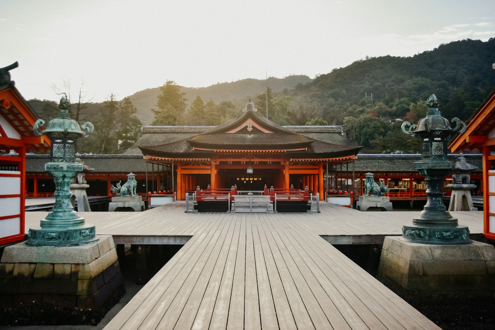 Japanese sacred shrine landscape at sunrise evoking Amaterasu and heavenly light